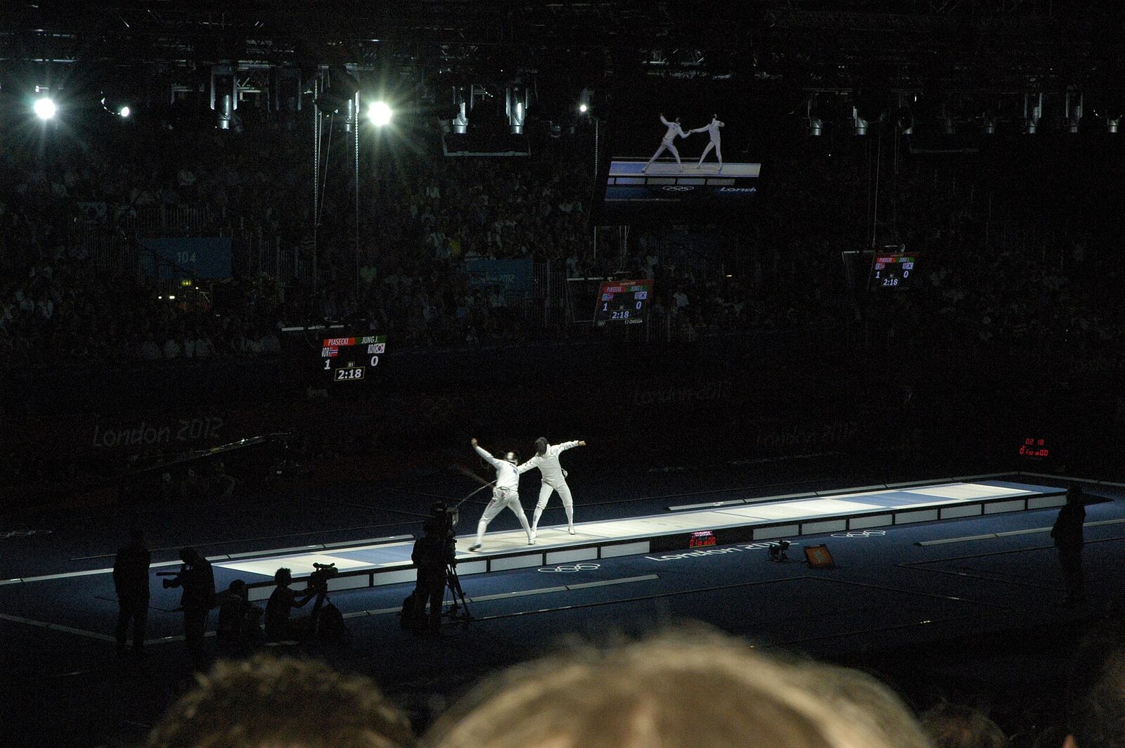 The men's epee semi-final on a glowing strip at the London 2012 Olympics